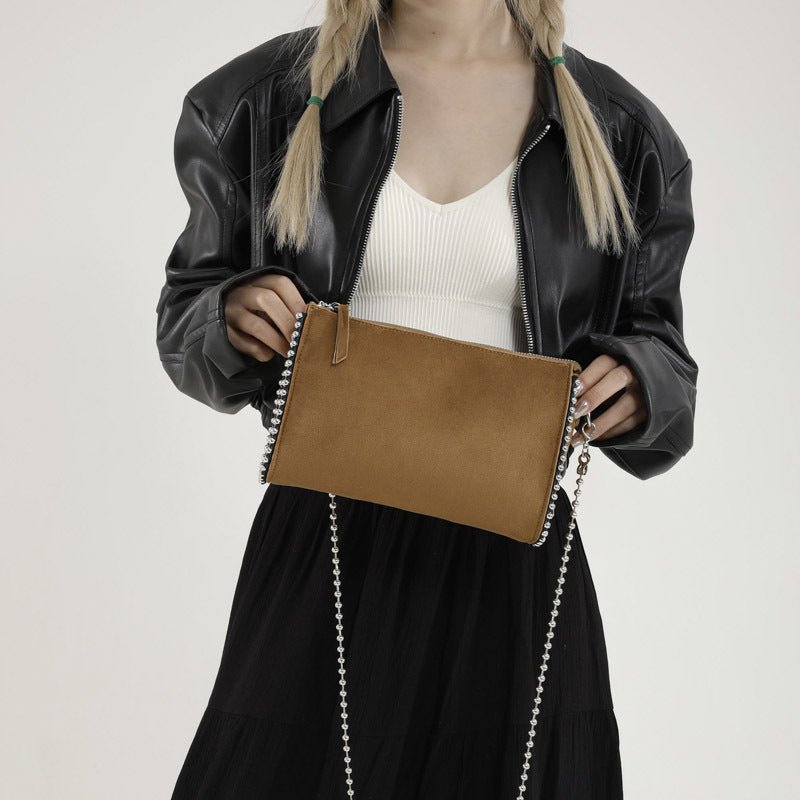 Fashion Simple Shoulder Crossbody Chain Bag $28.56 Dana Fashion Color: Black Women's Bags Product information: Color: black, red, brown Outer bag type: Sandwich pocket Hardness: soft Material: PU Suitcase shape: Horizontal Square Popular elements: rivets