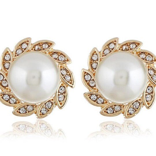 Fashion Simple Windmill Earrings For Women $15.00 Dana Fashion Colour: Picture Color Women's Accessories Product information: Treatment Process: Pearl Inlay Material: Alloy Shape: Flower Style: Casual Size: 2.3 Packing list: Earrings *1 pair Product Image