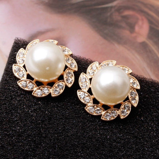 Fashion Simple Windmill Earrings For Women $15.00 Dana Fashion Colour: Picture Color Women's Accessories Product information: Treatment Process: Pearl Inlay Material: Alloy Shape: Flower Style: Casual Size: 2.3 Packing list: Earrings *1 pair Product Image