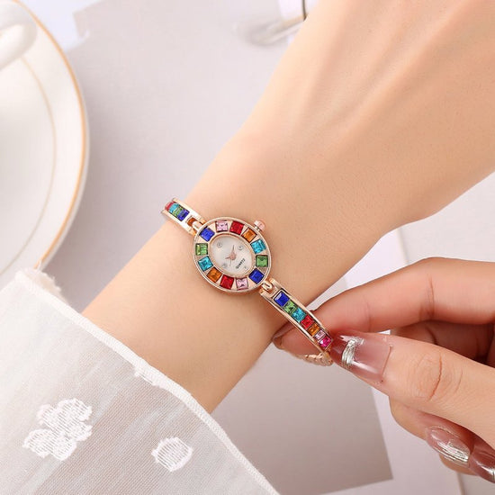 Fashion Small Oval Colorful Crystals Watch $14.82 Dana Fashion Color: Gold Women's Accessories Product information: Special function: Decoration Display type: pointer Style: Korean Waterproof: Not allowed Movement type: Quartz Thickness: 6.5mm Dial diamet