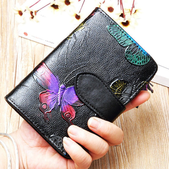 Fashion Women's Leather Wallet Short $39.00 Dana Fashion Color: Butterfly Women's Bags Product information: Pattern: Flowers Lining texture: Polyester Color: colorful rose, silver rose, gold leaf, butterfly Processing Method: soft surface Material: genuin