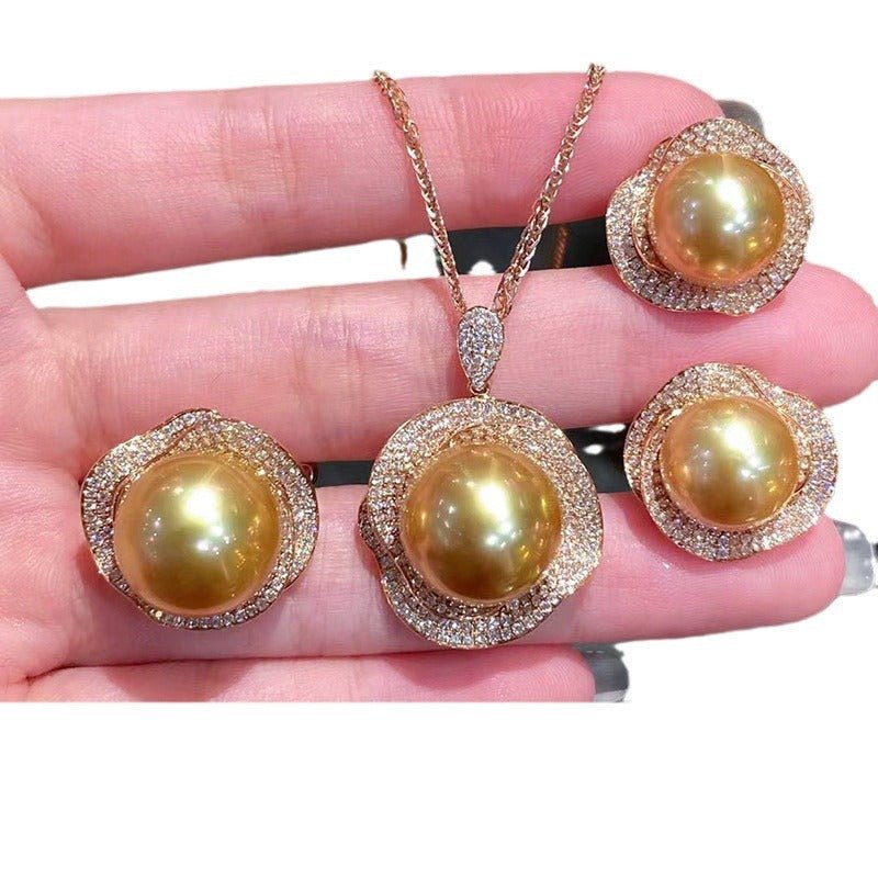 Fashion Zircon Flower Pearl Earrings $20.00 Dana Fashion Color: Necklace Gold Women's Accessories Product information: Treatment Process: inlaid zircon Color: necklace-gold, silver needle-gold, ring-Gold Applicable population: Female Material: Pearl Shape