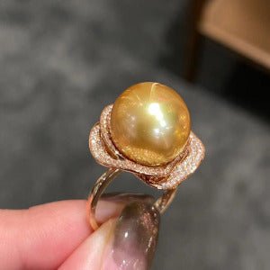 Fashion Zircon Flower Pearl Earrings $20.00 Dana Fashion Color: Ring Gold Women's Accessories Product information: Treatment Process: inlaid zircon Color: necklace-gold, silver needle-gold, ring-Gold Applicable population: Female Material: Pearl Shape: Fl