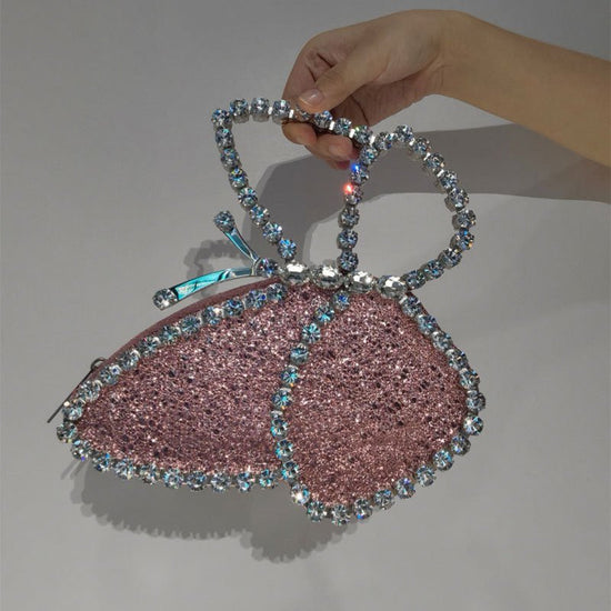 Fashionable Butterfly Clutch With Diamonds Diamond Dinner Bag Clutch $89.18 Dana Fashion Color: Pink Women's Bags Product information: The butterfly symbolizes freedom and beauty. After breaking out of the cocoon, it becomes a butterfly, which means a kin