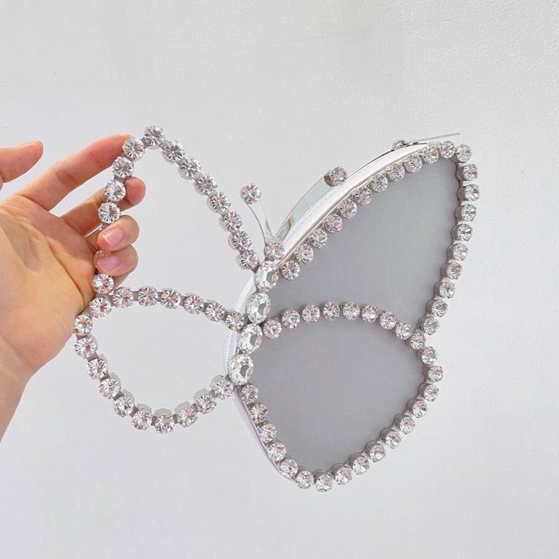 Fashionable Butterfly Clutch With Diamonds Diamond Dinner Bag Clutch $89.18 Dana Fashion Color: Silver Women's Bags Product information: The butterfly symbolizes freedom and beauty. After breaking out of the cocoon, it becomes a butterfly, which means a k