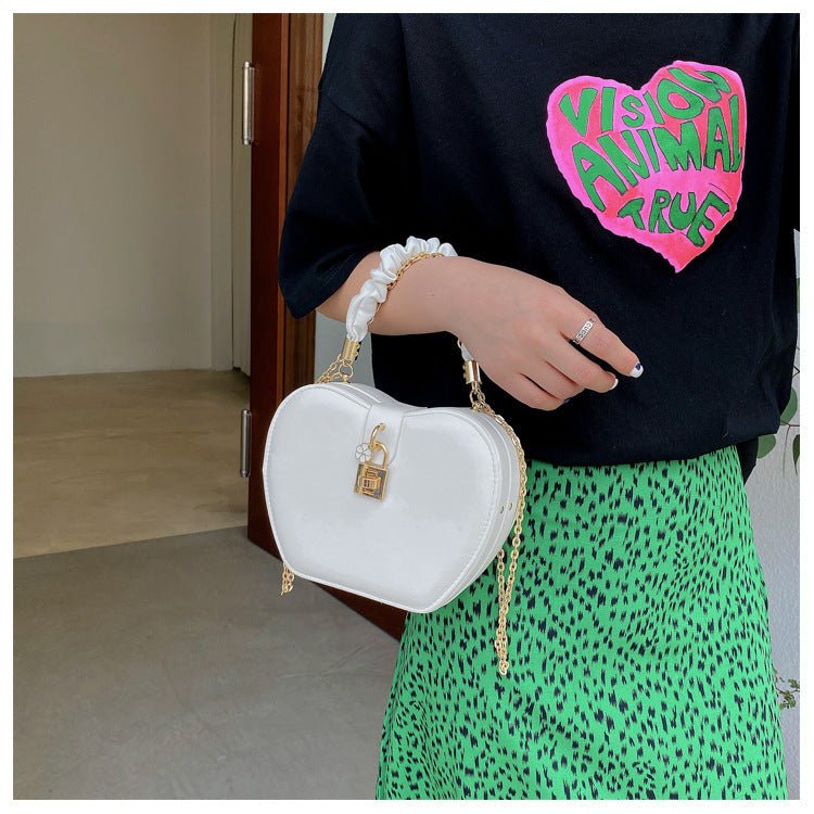 Fashionable Fold Ins Net Red Portable Chain Small Round Bag $41.45 Dana Fashion Color: White Women's Bags Product information: Material: pu leather Product Size: Upper width 17cm Bottom width 12cm Height 15cm Thickness 6cm Handle height 12cm Shoulder stra