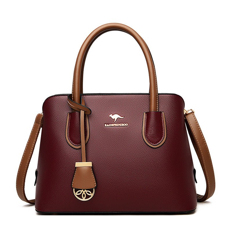 Fashionable Large-capacity High-end Women's Handbag $65.99 Dana Fashion Color: Wine Red Women's Bags Product information: Color: black, wine red, tawny, khaki, purple, green Hardness: soft Material: PU Popular elements: Letters Style: European and America