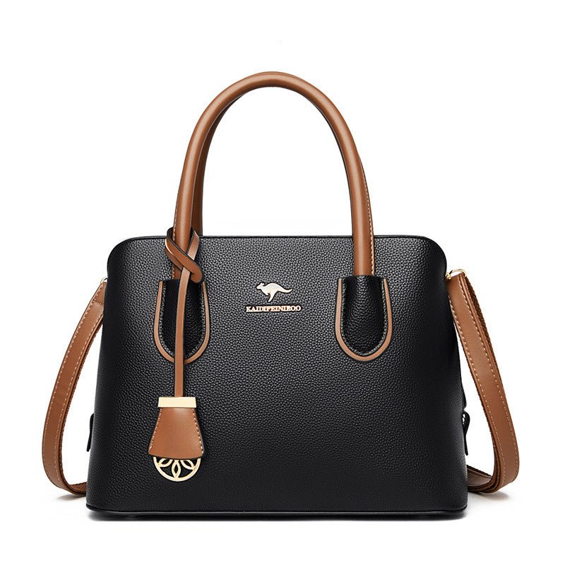 Fashionable Large-capacity High-end Women's Handbag $65.99 Dana Fashion Color: Black Women's Bags Product information: Color: black, wine red, tawny, khaki, purple, green Hardness: soft Material: PU Popular elements: Letters Style: European and American R