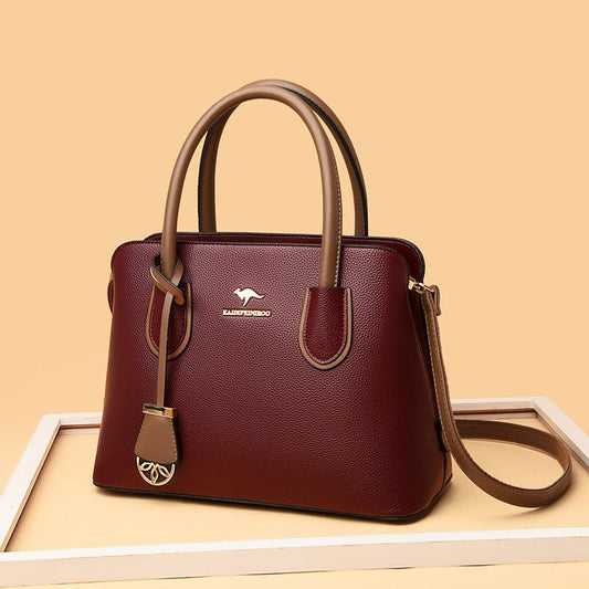 Fashionable Large-capacity High-end Women's Handbag $65.99 Dana Fashion Color: Black Women's Bags Product information: Color: black, wine red, tawny, khaki, purple, green Hardness: soft Material: PU Popular elements: Letters Style: European and American R