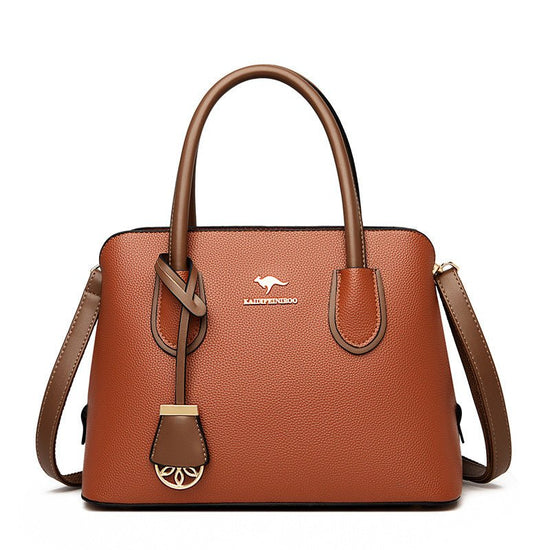 Fashionable Large-capacity High-end Women's Handbag $65.99 Dana Fashion Color: Yellowish Brown Women's Bags Product information: Color: black, wine red, tawny, khaki, purple, green Hardness: soft Material: PU Popular elements: Letters Style: European and