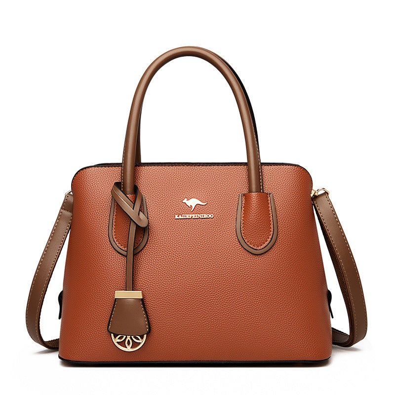 Fashionable Large-capacity High-end Women's Handbag $65.99 Dana Fashion Color: Yellowish Brown Women's Bags Product information: Color: black, wine red, tawny, khaki, purple, green Hardness: soft Material: PU Popular elements: Letters Style: European and
