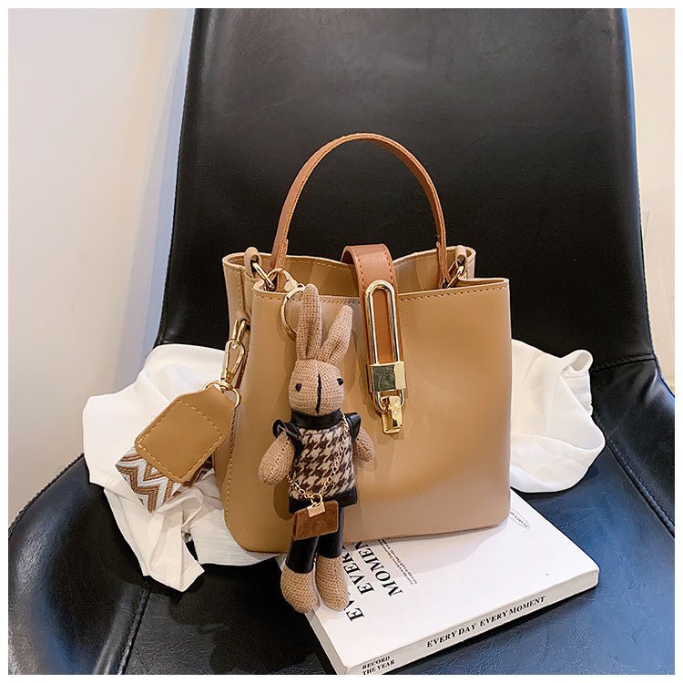 Fashionable Texture Hand-held Bucket Crossbody Bag $47.50 Dana Fashion Color: Khaki [with pendant] Women's Bags Product information: Applicable scenarios: Daily matching Color: black, white, khaki, brown, black [with pendant], white【 with pendant], khaki