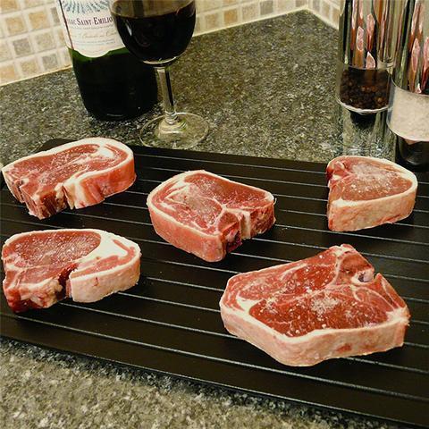 Fast Defrosting Tray Thaw Kitchen Quick Aluminum Thaw Plate $21.53 Dana Fashion Size: 1 style quantity: 1pc Dana's Kitchen Overview: No need to wonder how to defrost your food in minutes any longer! Imperial Home Quick Defrosting Tray lets you thaw your f