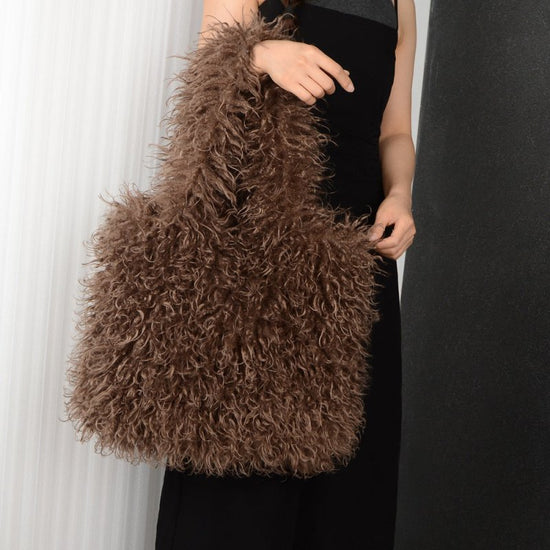 Faux Fur Beach Wool Plush Bag Portable Shoulder Large Capacity Totes $64.90 Dana Fashion Color: Deep Coffee Size: 30x40 Women's Bags Product information: Color: Black, camel, green, gray, orange, white, dark coffee, lotus root, Rose Red, light brown, pink