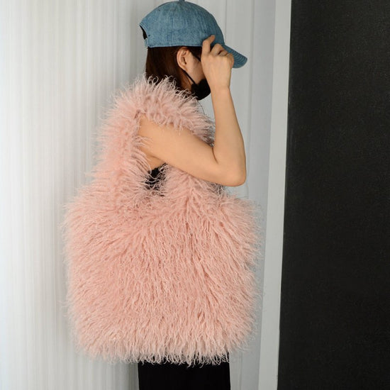 Faux Fur Beach Wool Plush Bag Portable Shoulder Large Capacity Totes $64.90 Dana Fashion Color: Lotus Root Color Size: 30x40 Women's Bags Product information: Color: Black, camel, green, gray, orange, white, dark coffee, lotus root, Rose Red, light brown,