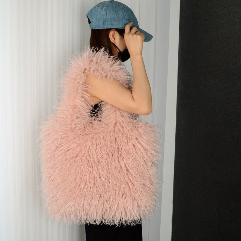 Faux Fur Beach Wool Plush Bag Portable Shoulder Large Capacity Totes $64.90 Dana Fashion Color: Lotus Root Color Size: 30x40 Women's Bags Product information: Color: Black, camel, green, gray, orange, white, dark coffee, lotus root, Rose Red, light brown,