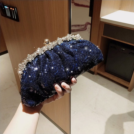 Female Blue Banquet Bag Chain Beads Handbag $42.28 Dana Fashion Color: Blue Women's Bags Product Introduction: Product category: dinner bag Material: bead Fabric texture: polyester Lining texture: acrylic Cover opening mode: latch Color: blue Size: 28 * 1