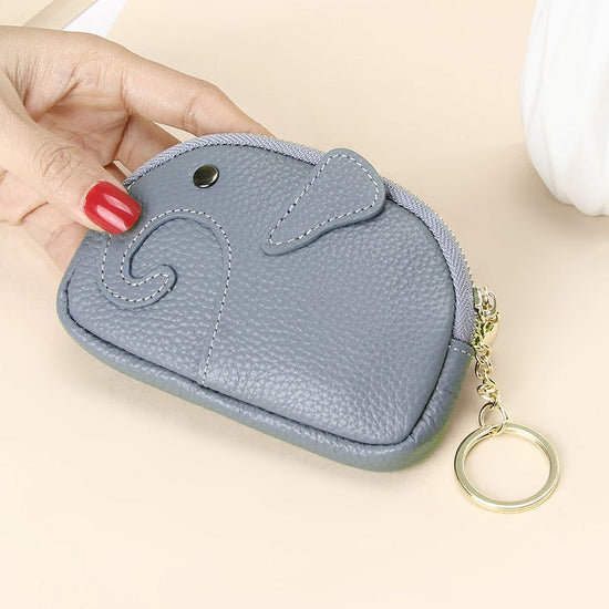 Female Creative Keychain Cartoon Elephant Wallet $23.47 Dana Fashion Color: Light Blue Women's Bags Product information: Pattern: solid color Lining texture: Polyester Applicable scenario: Daily matching Color: yellow, wine red, green, black, pink, gray,
