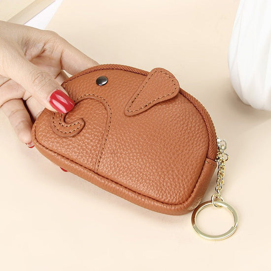 Female Creative Keychain Cartoon Elephant Wallet $23.47 Dana Fashion Color: Brown Women's Bags Product information: Pattern: solid color Lining texture: Polyester Applicable scenario: Daily matching Color: yellow, wine red, green, black, pink, gray, light
