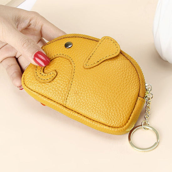 Female Creative Keychain Cartoon Elephant Wallet $23.47 Dana Fashion Color: Yellow Women's Bags Product information: Pattern: solid color Lining texture: Polyester Applicable scenario: Daily matching Color: yellow, wine red, green, black, pink, gray, ligh