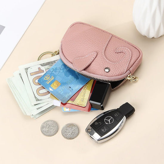 Female Creative Keychain Cartoon Elephant Wallet $23.47 Dana Fashion Color: Antique Silver Women's Bags Product information: Pattern: solid color Lining texture: Polyester Applicable scenario: Daily matching Color: yellow, wine red, green, black, pink, gr