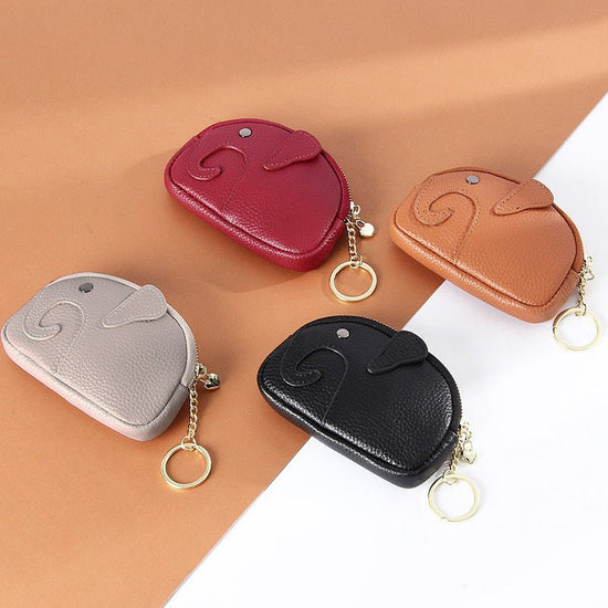 Female Creative Keychain Cartoon Elephant Wallet $23.47 Dana Fashion Color: Antique Silver Women's Bags Product information: Pattern: solid color Lining texture: Polyester Applicable scenario: Daily matching Color: yellow, wine red, green, black, pink, gr