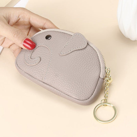 Female Creative Keychain Cartoon Elephant Wallet $23.47 Dana Fashion Color: Greige Women's Bags Product information: Pattern: solid color Lining texture: Polyester Applicable scenario: Daily matching Color: yellow, wine red, green, black, pink, gray, ligh