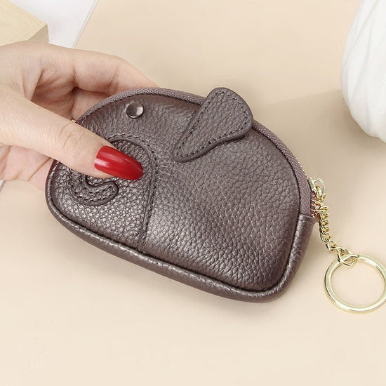 Female Creative Keychain Cartoon Elephant Wallet $23.47 Dana Fashion Color: Antique Silver Women's Bags Product information: Pattern: solid color Lining texture: Polyester Applicable scenario: Daily matching Color: yellow, wine red, green, black, pink, gr