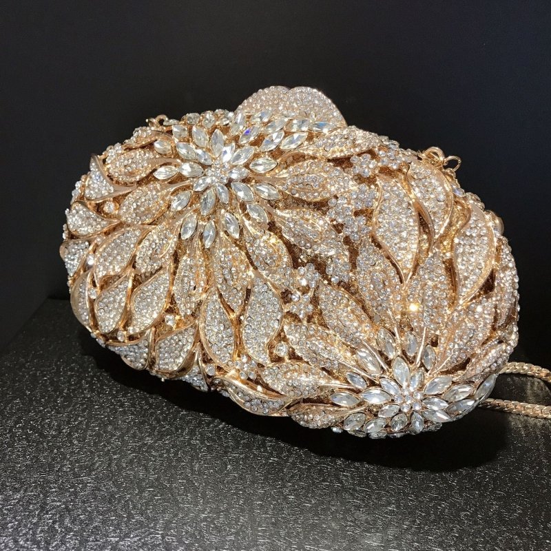 Female Leaf Flower Inlaid Diamond Dinner Bag $149.00 Dana Fashion Color: Champagne Size: BL504 Women's Bags Product information: Lining texture: synthetic leather Applicable scenarios: Daily matching Color: gold bottom white diamond, gold bottom gold Diam