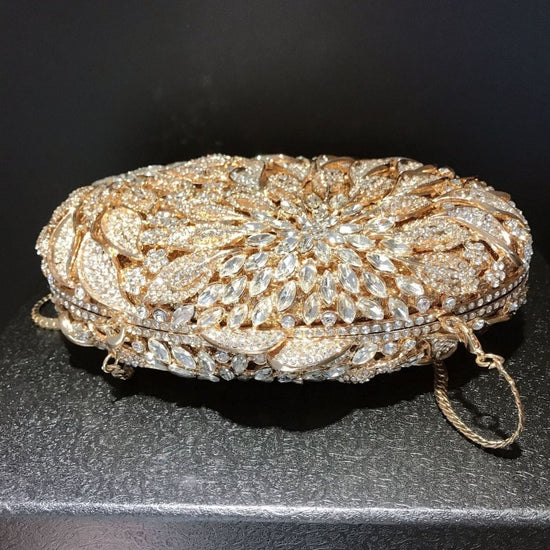 Female Leaf Flower Inlaid Diamond Dinner Bag $149.00 Dana Fashion Color: Champagne Size: BL504 Women's Bags Product information: Lining texture: synthetic leather Applicable scenarios: Daily matching Color: gold bottom white diamond, gold bottom gold Diam