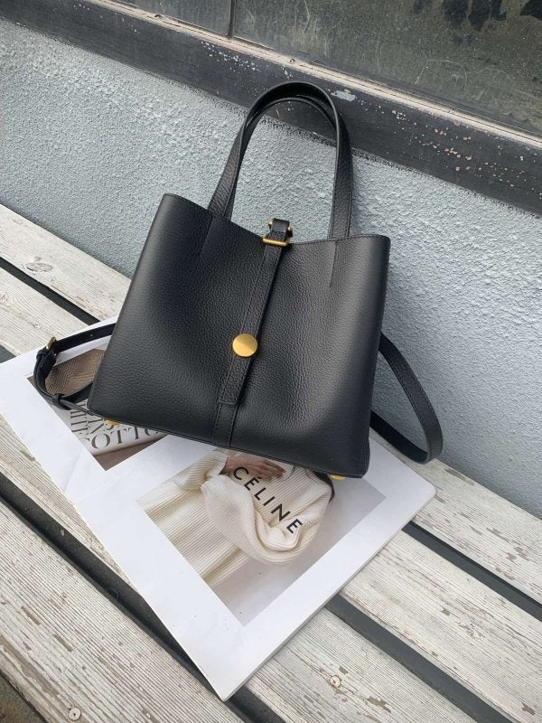 First Layer Cowhide Tote Genuine Leather Women $145.00 Dana Fashion Color: Black Women's Bags Product information: Lining texture: Polyester Applicable scenario: leisure travel Color: black, khaki, dark blue, taro, wine red, gray Outer bag type: Sandwich