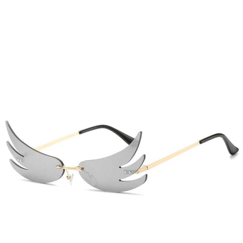 Flame sunglasses reflective sunglasses $20.00 Dana Fashion Color: Sliver Women's Accessories Specifications: Conventional Glasses structure: frame Whether polarized light: No Lens material: PC Style: Personality Frame material: plastic + metal UV resistan