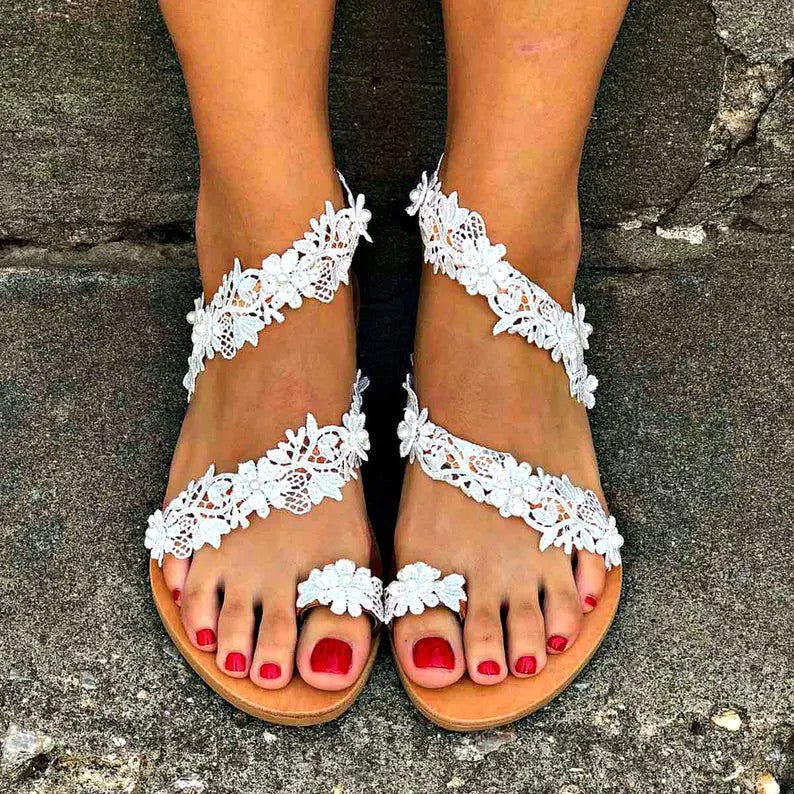 Flat Toe Ring Pearl Flower Sandals $31.79 Dana Fashion Color: Orange Size: 36 Women's shoes Product information: Pattern: Flowers Color: Orange Size: 36, 37, 38, 39, 40, 41, 42, 43 Sole craft: viscose shoes Sole material: rubber Popular elements: Flowers