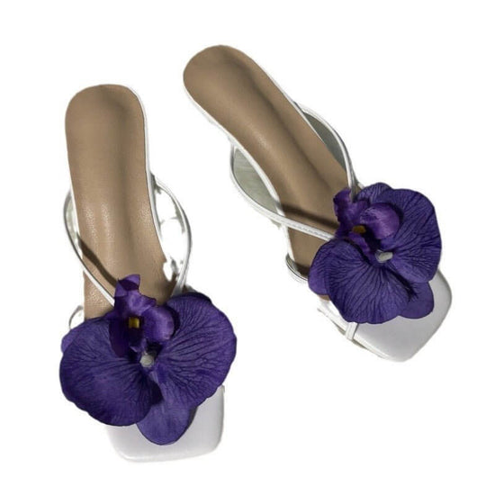 Flower Stylish Beach Slippers For Women $34.90 Dana Fashion Color: Blue Size: 35 Women's shoes Product information: Toe bracket shape: square head Color: pink, blue, rose, purple Shoe Upper material: PU Size: 35, 36, 37, 38, 39, 40, 41, 42 Sole material: