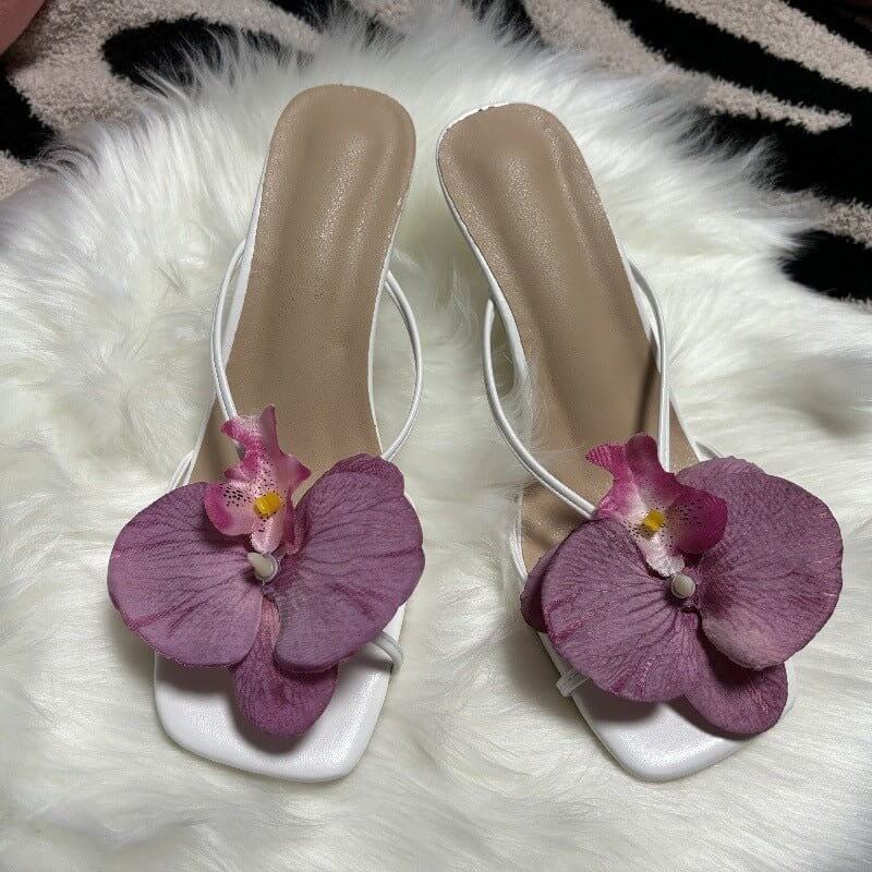 Flower Stylish Beach Slippers For Women $34.90 Dana Fashion Color: Blue Size: 35 Women's shoes Product information: Toe bracket shape: square head Color: pink, blue, rose, purple Shoe Upper material: PU Size: 35, 36, 37, 38, 39, 40, 41, 42 Sole material: