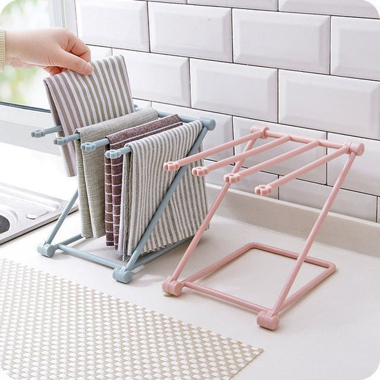 Foldable Dishcloth Shelf Kitchen Accessories Gadget Organizer $12.00 Dana Fashion Color: Blue Dana's Kitchen Overview： 100% Brand new and high quality. Design can be folded Vertical design, quilt bottles can be neatly stored Specification： Size: 20 cmx16c