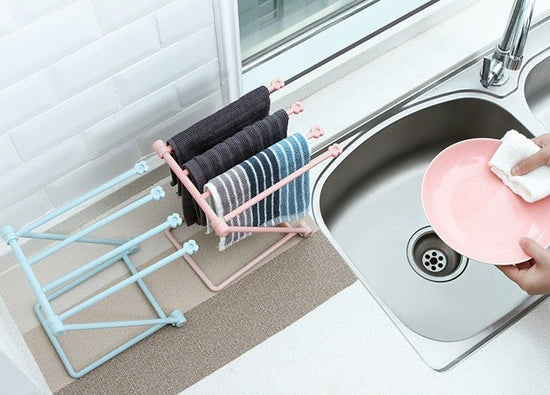 Foldable Dishcloth Shelf Kitchen Accessories Gadget Organizer $12.00 Dana Fashion Color: Blue Dana's Kitchen Overview： 100% Brand new and high quality. Design can be folded Vertical design, quilt bottles can be neatly stored Specification： Size: 20 cmx16c