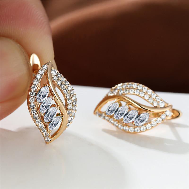 Four Diamond Leaf Slightly Zircon-encrusted Stud Earrings High-grade $16.50 Dana Fashion Color: Champagne Gold Women's Accessories Product information: Color: champagne gold yellow diamond, Champagne Gold Champagne, Champagne Gold olive green, champagne g