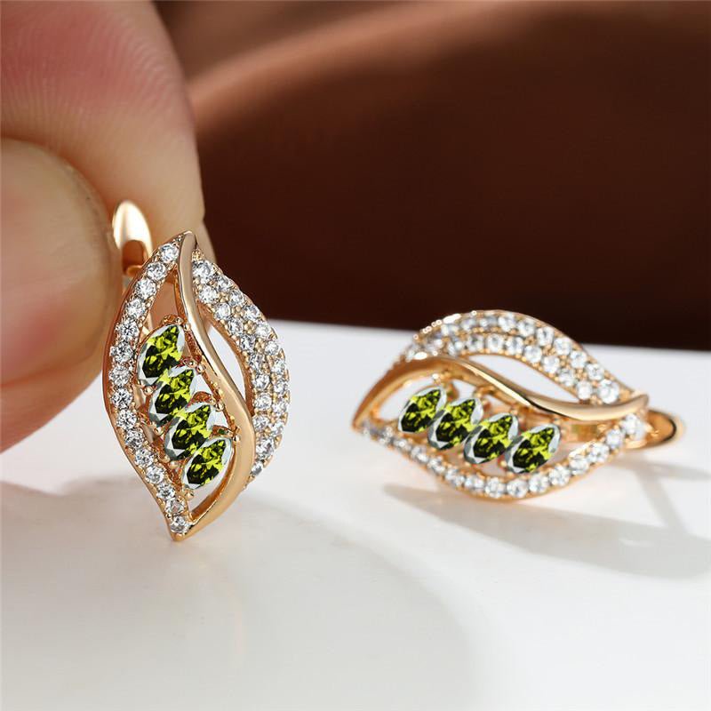Four Diamond Leaf Slightly Zircon-encrusted Stud Earrings High-grade $16.50 Dana Fashion Color: Champagne Golden Olive Women's Accessories Product information: Color: champagne gold yellow diamond, Champagne Gold Champagne, Champagne Gold olive green, cha