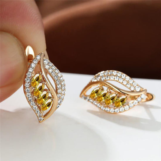Four Diamond Leaf Slightly Zircon-encrusted Stud Earrings High-grade $16.50 Dana Fashion Color: Champagne Gold Yellow Women's Accessories Product information: Color: champagne gold yellow diamond, Champagne Gold Champagne, Champagne Gold olive green, cham