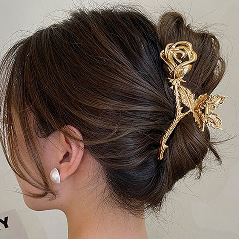 French Niche Design Temperament Silver Metal Rose Grip Clip Women's Back Of The Head Plate Hair Clip $19.00 Dana Fashion Color: Gold Women's Accessories Product attributes Type: Hair clip Material texture: alloy Inlay Material: None Brand: Jiutong Shape:
