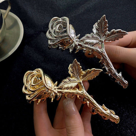 French Niche Design Temperament Silver Metal Rose Grip Clip Women's Back Of The Head Plate Hair Clip $19.00 Dana Fashion Color: Gold Women's Accessories Product attributes Type: Hair clip Material texture: alloy Inlay Material: None Brand: Jiutong Shape: