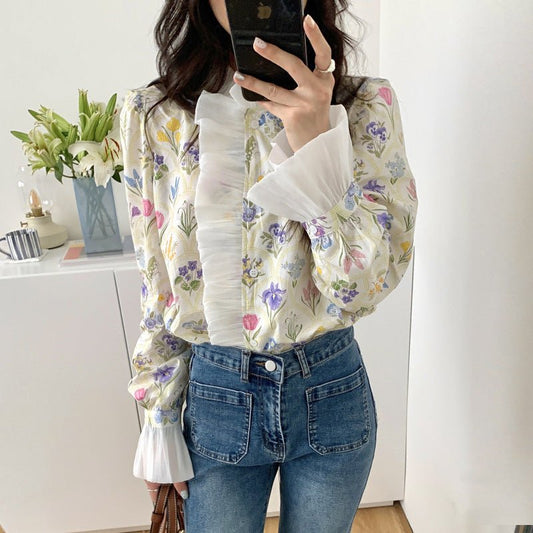 French Romantic Turtleneck Patchwork Ruffled Color Printing Design Flare Sleeve Shirt $34.50 Dana Fashion Color: Color Size: L Women's clothing Product information: Fabric name: acrylic Color: Color Sleeve type: bell sleeve Size: S,M,L,XL Style type: temp