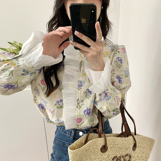 French Romantic Turtleneck Patchwork Ruffled Color Printing Design Flare Sleeve Shirt $34.50 Dana Fashion Color: Color Size: L Women's clothing Product information: Fabric name: acrylic Color: Color Sleeve type: bell sleeve Size: S,M,L,XL Style type: temp