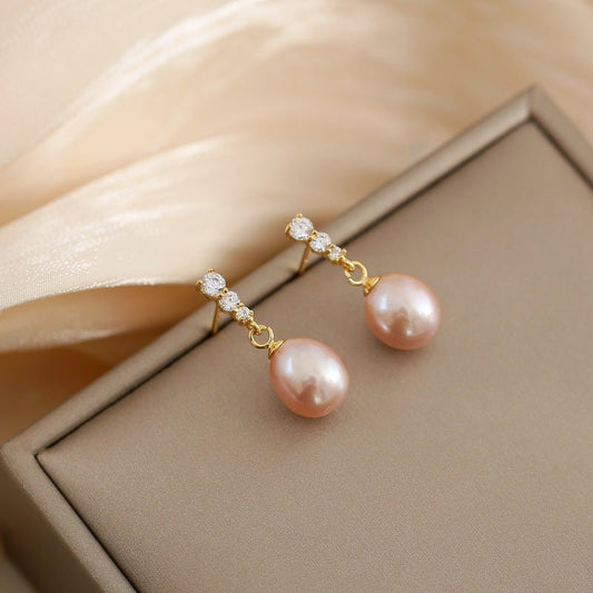 French Style All-match Fashion Earrings $14.99 Dana Fashion Color: Pink Women's Accessories Product information: Treatment Process: Electroplating Color: oval pearl zircon earrings-white, oval pearl zircon earrings-pink Applicable population: Female Mater