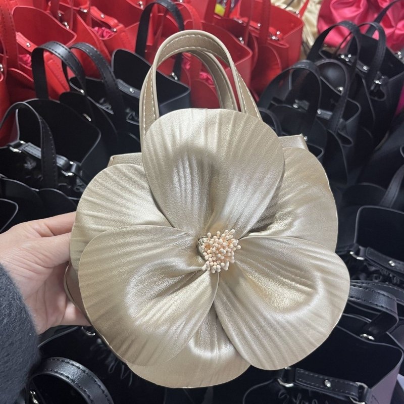 French Style Petal Flower Tote Bag One Shoulder Crossbody $78.50 Dana Fashion Color: Champagne Women's Bags Product information: Lining texture: no lining Color: pink, classic black, red, champagne gold Outer bag type: open pocket Hardness: medium Materia
