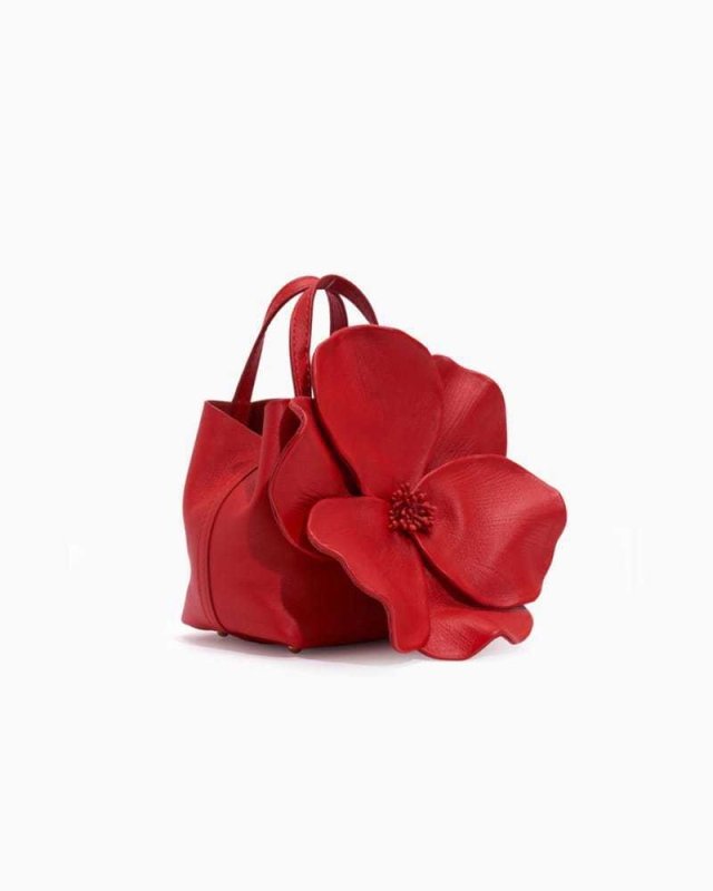 French Style Petal Flower Tote Bag One Shoulder Crossbody $78.50 Dana Fashion Color: Champagne Women's Bags Product information: Lining texture: no lining Color: pink, classic black, red, champagne gold Outer bag type: open pocket Hardness: medium Materia