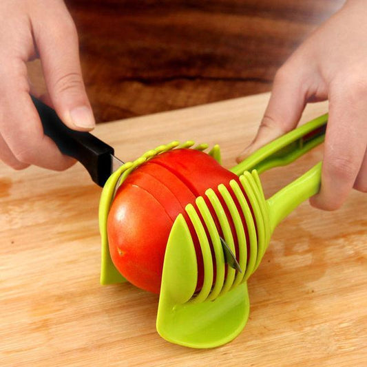 Fruit & Veggie Cutting Holder $15.00 Dana Fashion Color: Black Dana's Kitchen Feature Made from high duty plastic material Creative design / Eco-friendly / non-toxic Quick & easy to use and clean. Specification 100% brand new and high quality Size:( 18.5*
