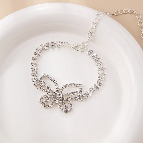 Full Diamond Butterfly Multilayer Fashion Full Diamond Rhinestone Anklet $10.00 Dana Fashion Color: Gold Women's Accessories Product information: Color: gold, silver Inlaid material: gold-plated inlaid artificial gem/semi-precious stone Style: Women's Mat