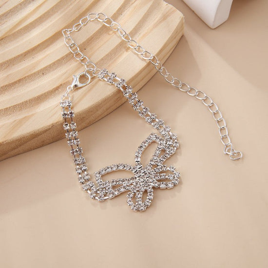 Full Diamond Butterfly Multilayer Fashion Full Diamond Rhinestone Anklet $10.00 Dana Fashion Color: Gold Women's Accessories Product information: Color: gold, silver Inlaid material: gold-plated inlaid artificial gem/semi-precious stone Style: Women's Mat